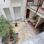 Parisian Nest I Stone Walls & Authentic Charm Апартаменты Париж