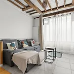 Parisian Nest I Stone Walls & Authentic Charm Апартаменты *