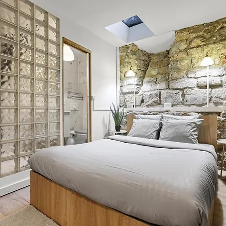 Parisian Nest I Stone Walls & Authentic Charm Апартаменты *